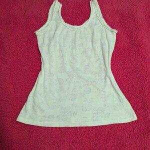 White floral lace tank top with ruffled trim on collar